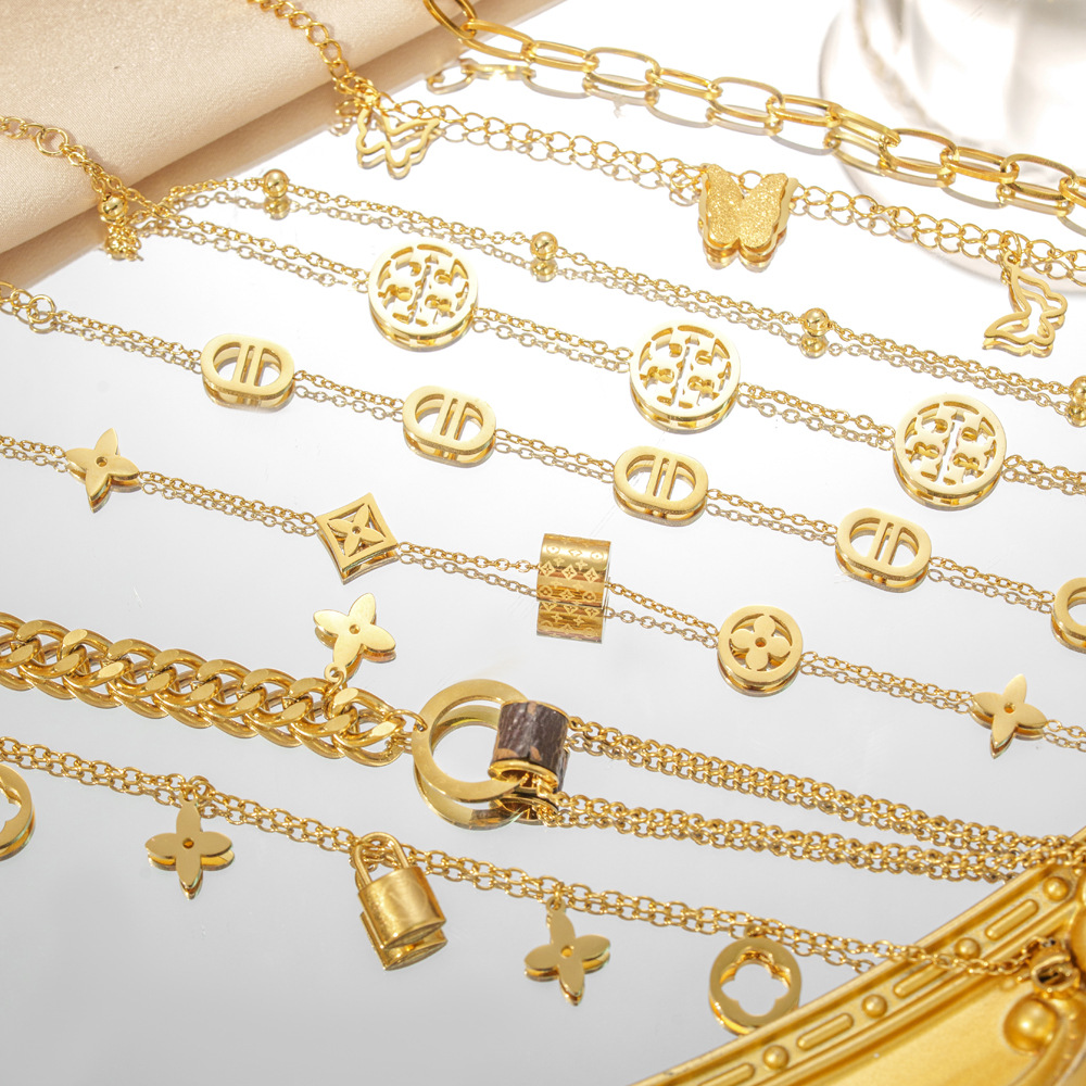 Трансграничный браслет из титановой стали Роскошная ниша, утонченная эстетика 18-каратное золото Минималистичная нержавеющая сталь Ниша, стойкие к выцветанию украшения для женщин