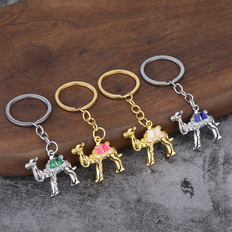 Прямо от производителя: сувениры из Синьцзяна – креативные брелки с изображением верблюдов, брелки для автомобильных ключей, подвески в форме животных, изысканные украшения для сумочек.